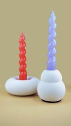Fuzzy white and blue concrete bubble candle holders with round, tall shapes.
