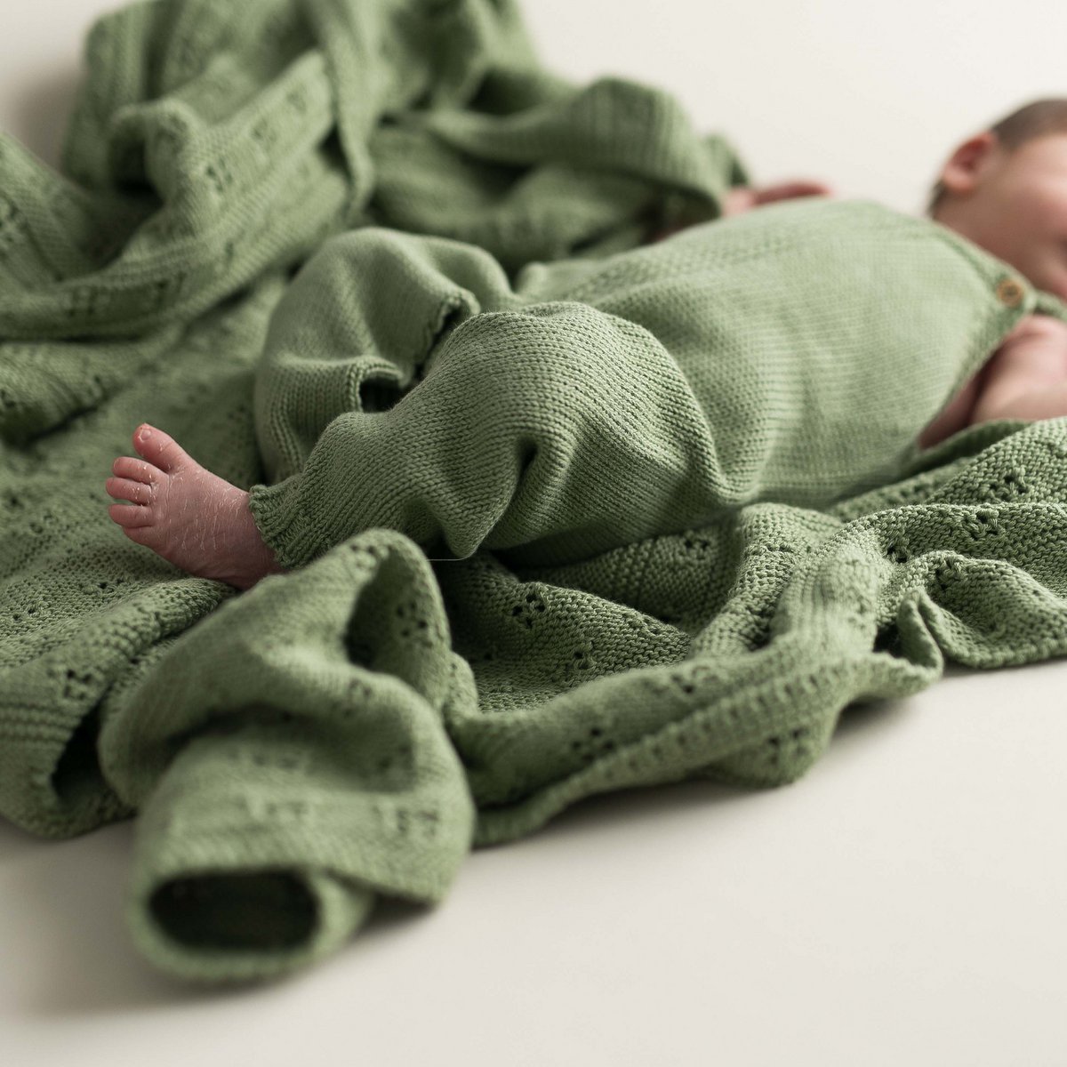 Coperta per bebè traforata menta