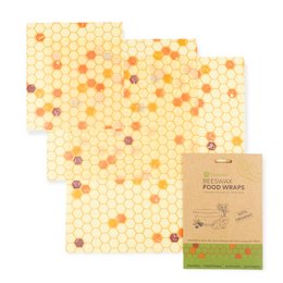 Organic cotton beeswax food wraps in a set of 3, featuring a honeycomb pattern in shades of yellow and orange.