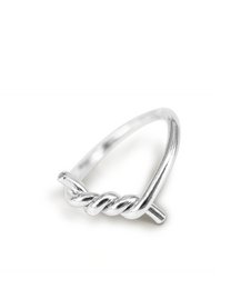 Silver statement ring with a curved, sculptural design.