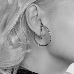 Ear Cuff con linea fluida geometrica 3D: un paio