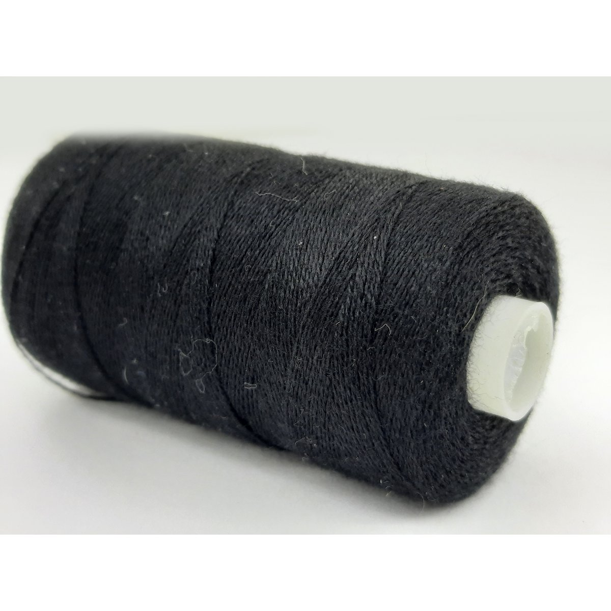 %2340 black sewing thread on a roll