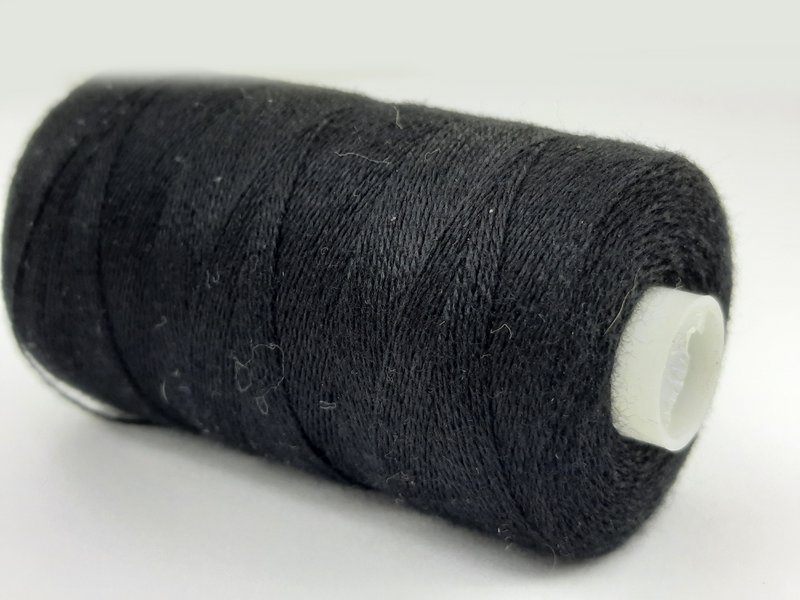 %2340 black sewing thread on a roll