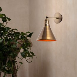 Veysel N 681 Plastered Wall Lamp, a modern wall light with a brass-finished metal shade that provides warm, ambient lighting for a wall in a living room or bedroom.