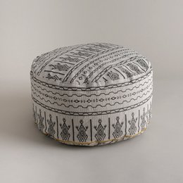 A round, gray and white patterned pouf with a textured, woven design. The pouf appears to be made of a soft, fabric material and is suitable for use as a meditation cushion or floor seating.