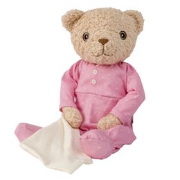 Soft, plush teddy bear in pink nightwear with a blanket, perfect for cuddling and comfort.