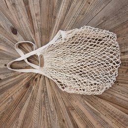 Ecru and brown reusable mesh shopping bags with a net-like design and handles.