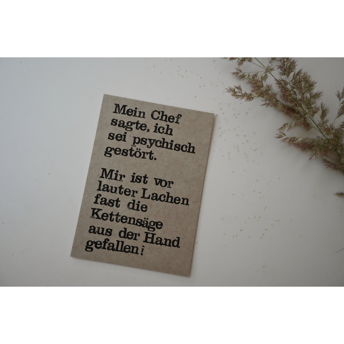 Stempelte Postkarte "Kettensaege"