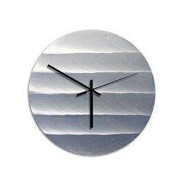 Horloge murale en aluminium poli