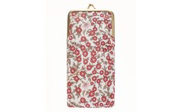 A green olive-colored glasses case with a floral pattern in shades of red, yellow, and green.