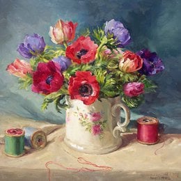 Colorful anemone flowers in ceramic pitcher, pink red purple blooms, vintage floral arrangement with thread spools.