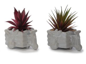 Tro -Bike gemaakt van keramiek met kunstmatige planten 13x9x15cm