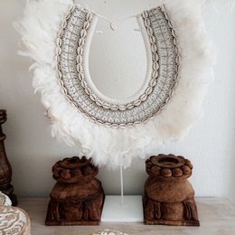 Decorative necklace with feathers and shells
