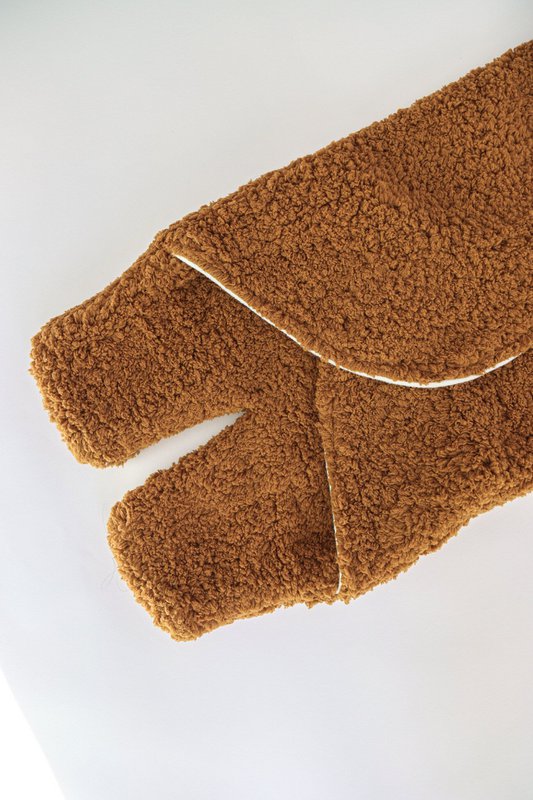 Couverture d'emmaillotage en peluche