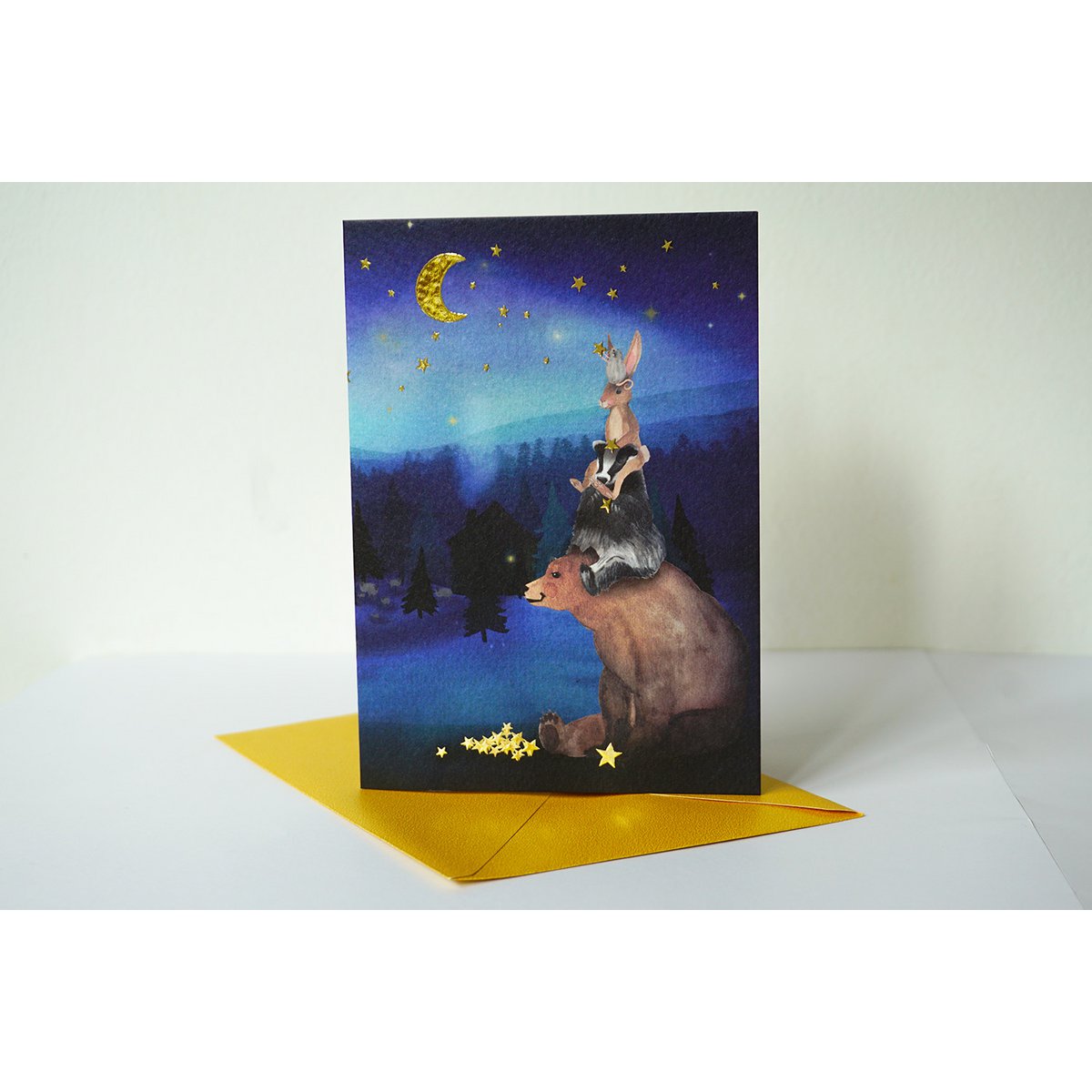 Aufhängen von Weihnachtskartensternen mit Folienprägung