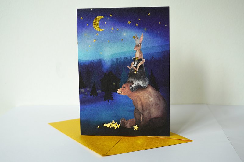 Hanging up Christmas card stars with foil stamping