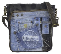 A large, denim-based crossbody bag with a vintage, courier-style design. Features multiple pockets, a shoulder strap, and a distressed, recycled denim and canvas construction.