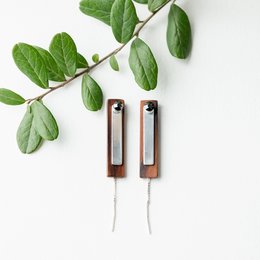 Elegant rosewood drop earrings with a sleek, minimalist design. Crafted with high-quality materials for a sophisticated look.