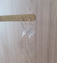 Rhodium plated butterfly earrings with charms