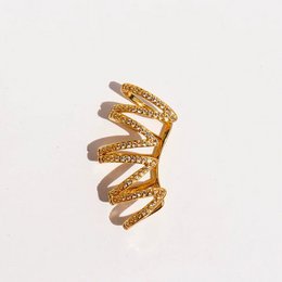 Polsino auricolare avvolgente con pavé geometrico