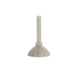 Tall pillar candle, beige linen color, petal-shaped ridged base, sculptural design, modern aesthetic