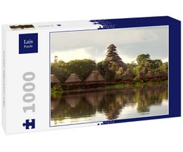 A 1000-piece puzzle depicting a scenic view of a rainforest lodge in Ecuador, with a traditional wooden structure reflected in the calm waters.