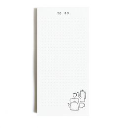A simple, minimalist notepad with a "To do" title and a graphic of office supplies emerging from a box, indicating a product that is packaged in a plastic-free manner.