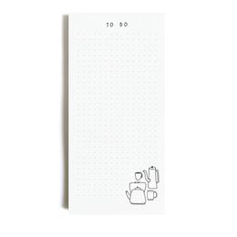 A simple, minimalist notepad with a "To do" title and a graphic of office supplies emerging from a box, indicating a product that is packaged in a plastic-free manner.