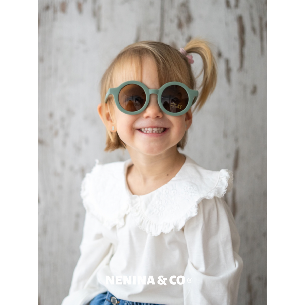 Nachhaltige grüne Baby-Sonnenbrille Nenina & Co