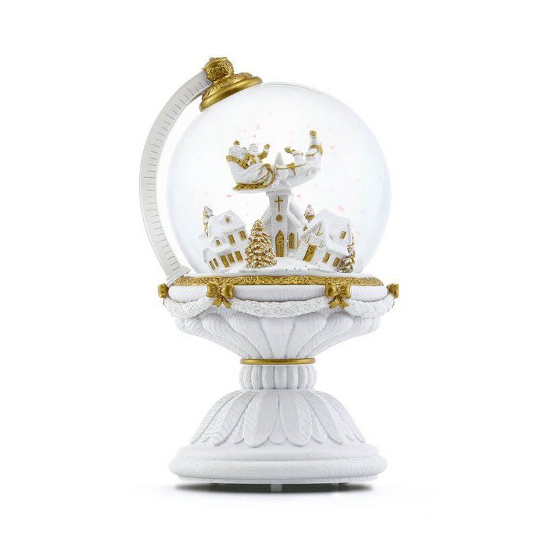 Die kugelförmige Weihnachtsschneekugel mit automatischem Schneesturm und Lichtern.
