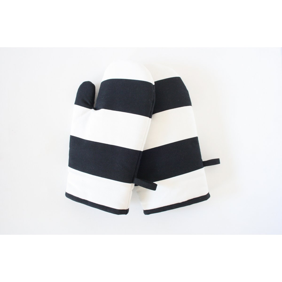 White and black striped oven gloves