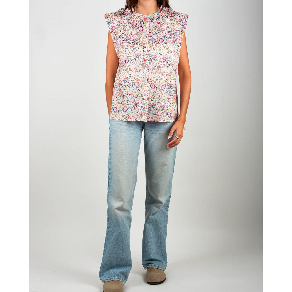 La blouse femme sans manches à volants Febre rose