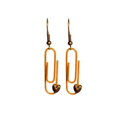  "Orange Personalised Paperclip Earrings with heart-shaped charms, made by lovedbynlanla. Drop earring style in a variety of vibrant colors."

The image shows a set of orange paperclip-shaped earrings with heart-shaped charms. The earrings appear to be made of a metal material and have a drop style design. The product is described as "Orange Personalised Paperclip Earrings | by lovedbynlanla" and is categorized as "Drop Earrings".