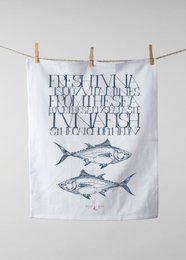 A tea towel featuring a graphic design of a tuna fish with text in a minimalist, typographic style.