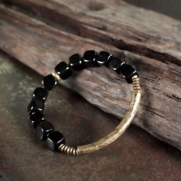 Bracciale a blocchi di ossidiana nera con bracciale rigido in bronzo