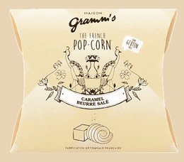 Salted butter caramel flavored popcorn cases, 30g per pack. Popcorn snack with a sweet and salty taste.
