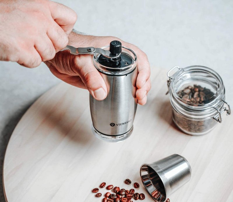 Manuelle Hand-Kaffeemühle mit Keramikmahlwerk und stufenloser Mahlgradeinstellung