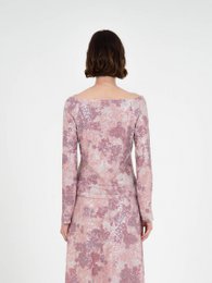 Top met sterrenprint en pailletten