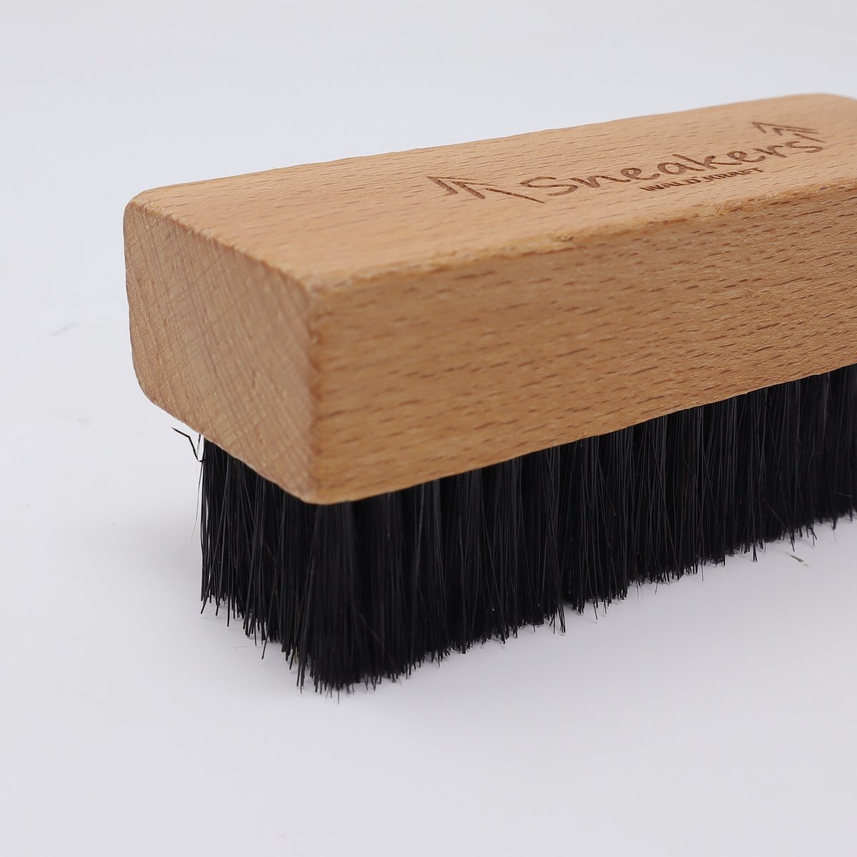 Sneaker brush with dark bristles