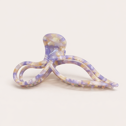  Coquette HAIR CLIP, a stylish hair accessory available in Sauvage, Multi Purple, White Pearl, Tortoise Coffee, and Tortoise Brown colors. The clip features a unique floral design that adds a touch of elegance to any hairstyle.