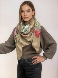 Beige and green floral printed scarf with red accents. Soft, lightweight material. Versatile accessory for casual or formal wear.