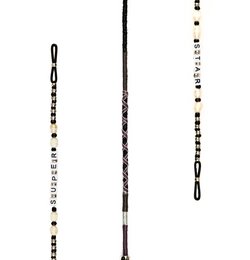 A black and white beaded eyewear strap with a pearl accent. The strap is designed to hold and secure eyeglasses or sunglasses.