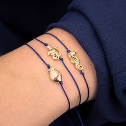 Bracciale su carta - Tartaruga Oro - Contro la voglia di viaggiare - Ciondolo placcato oro 24K - Macrame - Carta riciclata DIN A6 - Collezione marittima