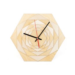 A round, wooden wall clock with a geometric, spiral design. The clock has a natural, light-colored wood finish and a simple black clock face with red hands.
