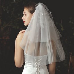 Elegante velo nupcial de tres niveles con red para cubrir la cara