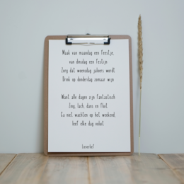 Poster with inspirational text and wooden frame, suitable for wall decor.