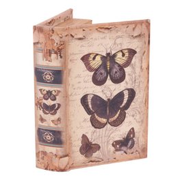  A decorative wooden box with a butterfly design, suitable for storing jewelry or other small items.