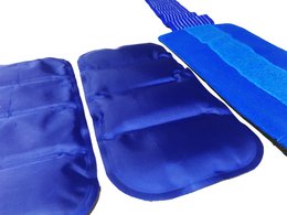 Reusable universal hot/cold compress with velcro closure, made of durable blue fabric, designed for first aid and medical applications.