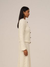 Cardigan bianco lavorato a maglia nuda