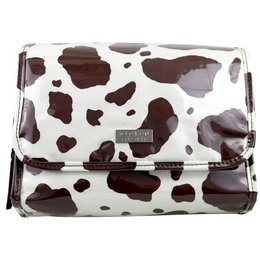 A white and brown cow-print foldout bag with a hook for hanging. The bag appears to be made of a durable, water-resistant material and has a flap closure.